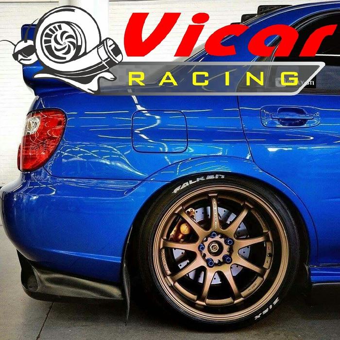 Subaru azul con rines dorados - taller mecanico Vicar Racing en Veracruz